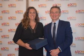 Katie Buckley, Coolum Advertiser accepts award from Peter Kennedy, Regional Media Connect