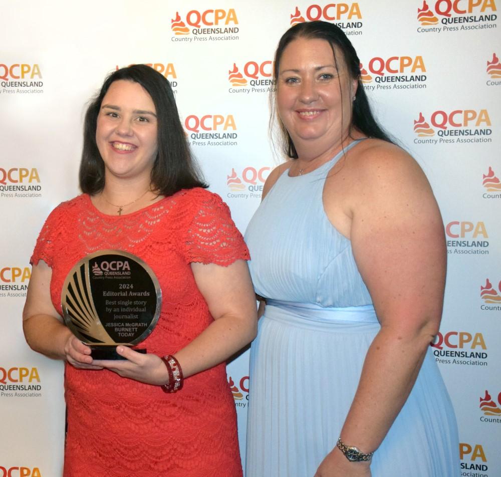 Jessica McGrath, Burnett Today accept award from Tanya Gordon, APS